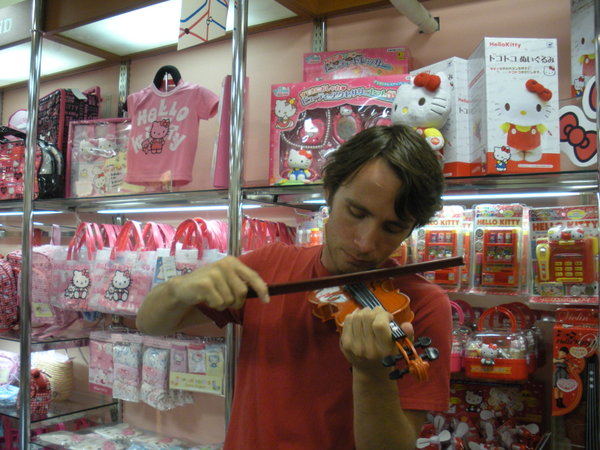 Brad playing hello kitty violin