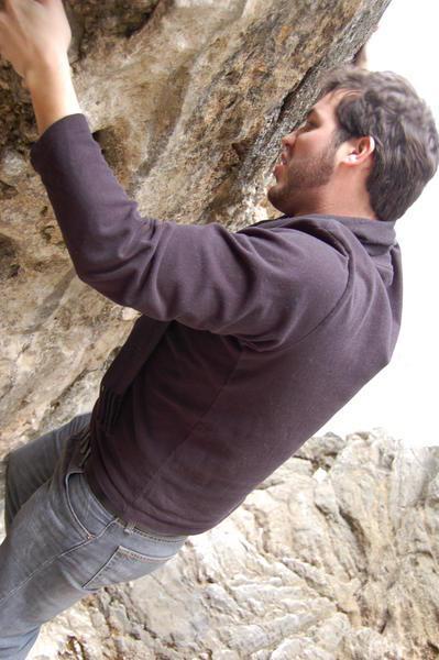 Matt scaling the cliff.