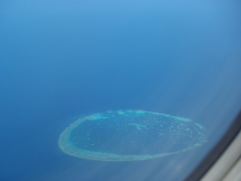 First view of the Great Barrier Reef from the airplane
