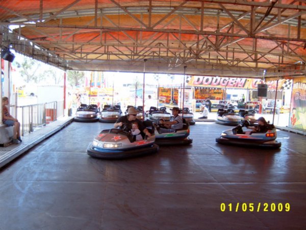 Having fun at the dodgems with Pop & Dad, not scared at all