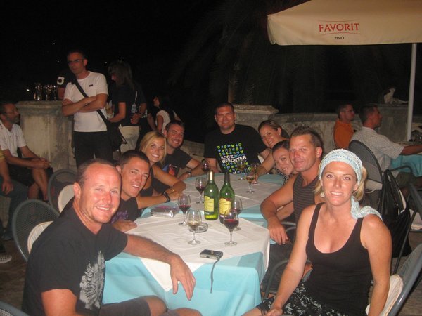 sitting down to dinner at Korcula island on black night
