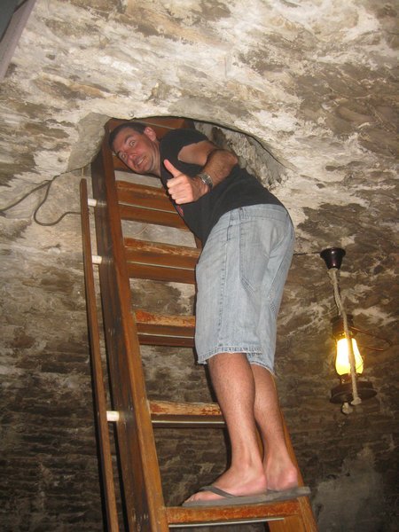 climbing up the ladder to the castle turret bar