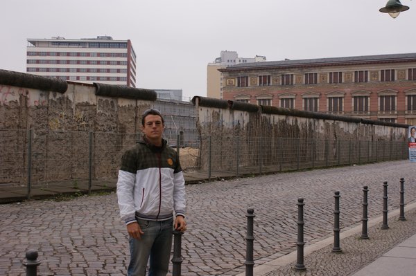 Vince standing across from the Berlin wall