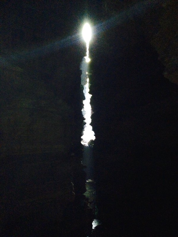 slit in the dark depths of the cave