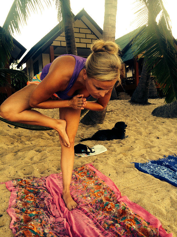 More beach yoga with one of our little beach friends at the back