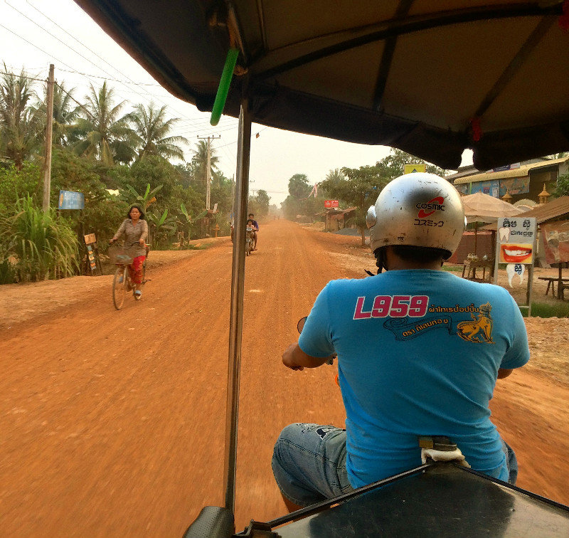 early morning tuk tuk ride with our "healthy" cambodian driver