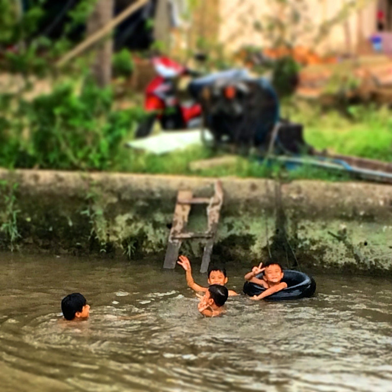 kids playing in the Mekong
