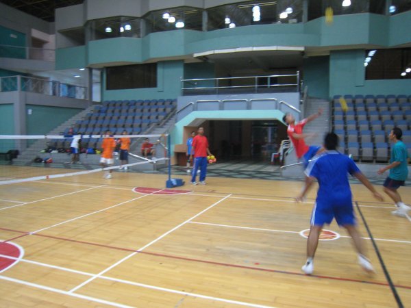 the local sport of sepak takraw or foot volleyball