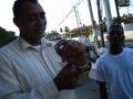 Deputy Mayor Jorge Espaillat trying on his Passporters wristband