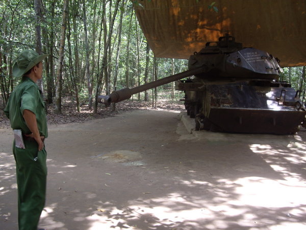 Guide with tank