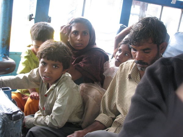 Migrating family in the bus
