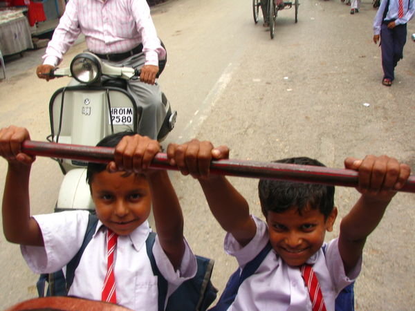 Boys getting free ride on our rickshaw