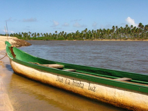 Faith written on canoe at rio Maragogi.
