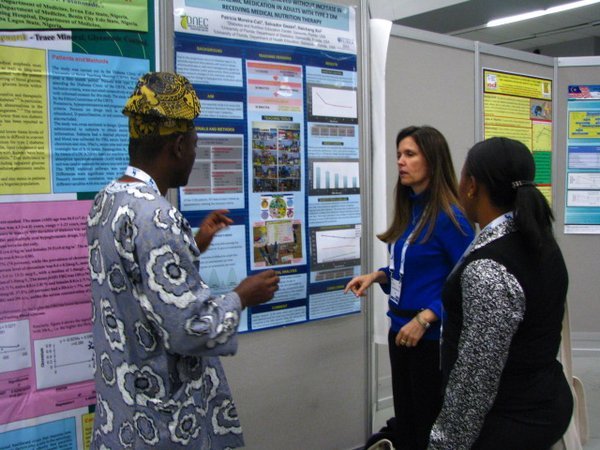 Doctors from Tanzania and Nigeria discussing my research