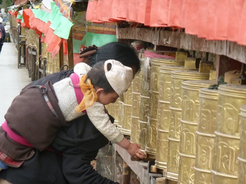 Learning to spin prayer wheels