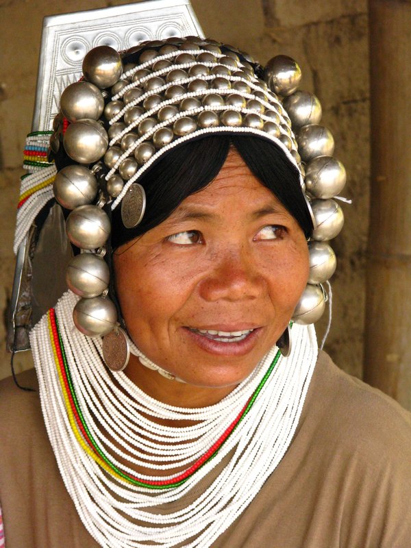Akha Woman with traditional silver headpiece