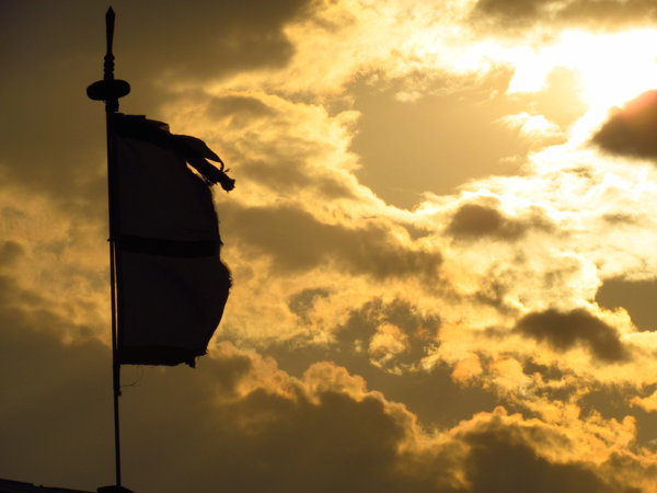 Flag against the sunset