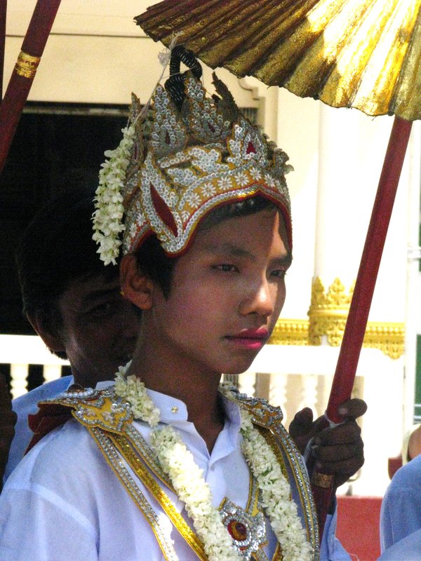 Teen in traditional clothing for initialtion ceremony
