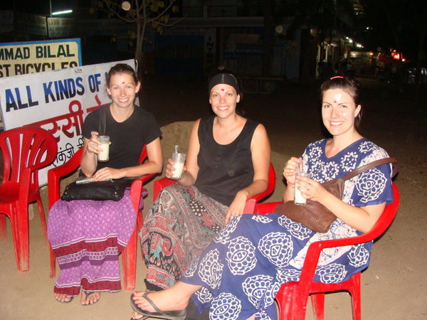 Khajuraho - drinking lassi on the side of the road (we had just been at a temple for a Shiva ceremony, hence the dots)