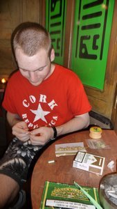 Steve rolling my first joint in the Dam *cough