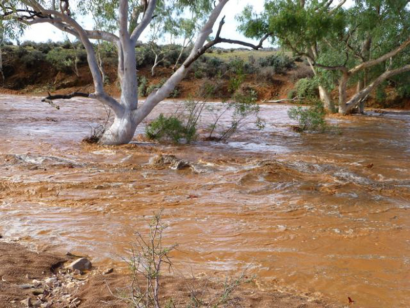 a dry creek bed becomes a torrent