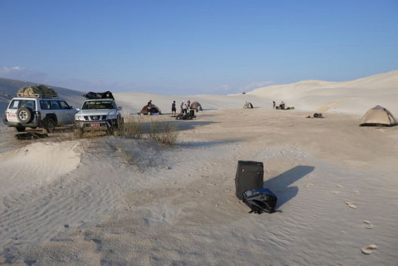 setting up camp in the Al Khaluf dunes