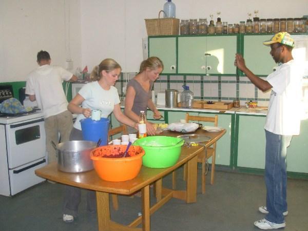 the volunteers at work preparing the meal