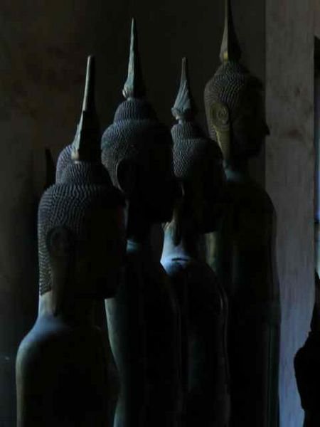 spare Buddha figures inside Wat Visounnarth