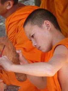 monk at art school at Wat Xieng Maun