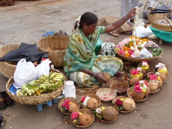 puja offering seller outside Sri Chamundeswari Temple, Mysore
