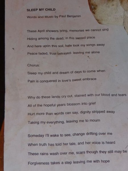 poem beside the dead children