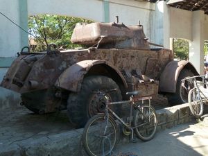a tank from the war put to more practical use as a bike rack