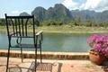 Kicking back with a drink and admiring the view in Vang Vieng