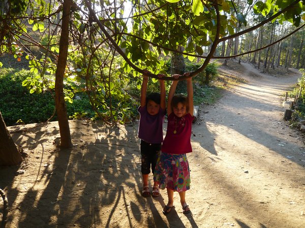 Chloe and Natalia swinging from the vines