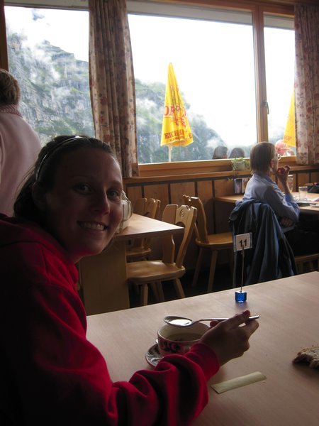 lisa eating soup at a cafe in the alps!