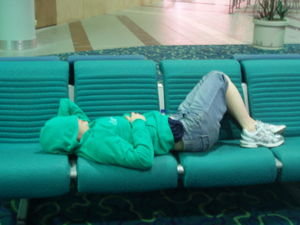 beth sleeping in the airport