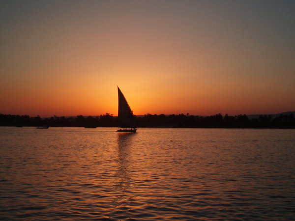 sailboat on the Nile at sunset 