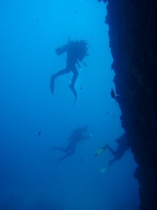 Divers exiting the cave