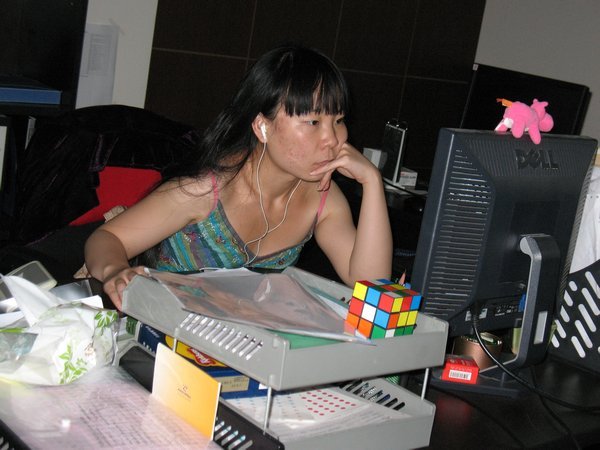 Jiang Hong working at her desk.