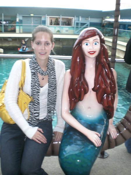 Awkward mermaid pose