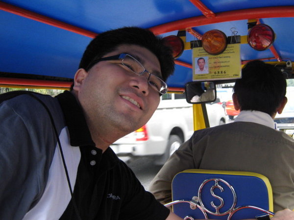 riding a tuktuk