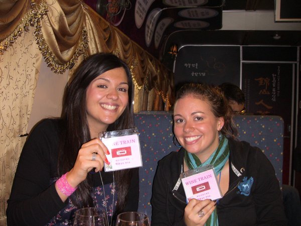 Lydia & Jess with their wine train passes on