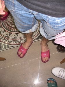 Fran in his pink sandles before the wine footbath