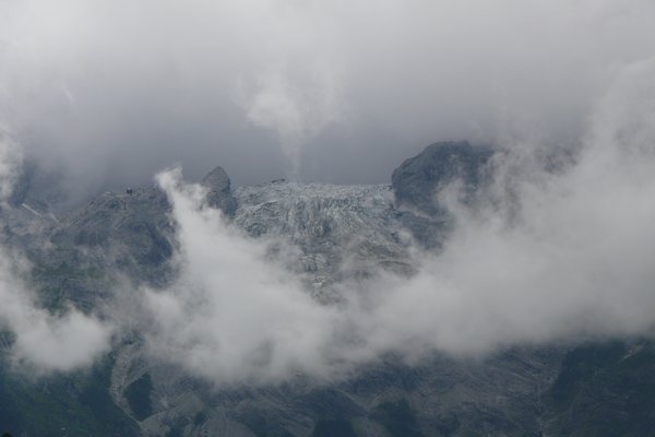 Yuelong Glacier through veil of mist