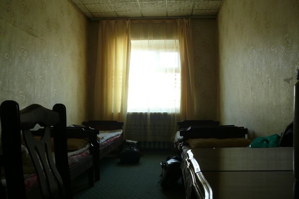 Mellow yellow...chinz curtains, carpeted wooden floors and pastel wallpaper...a cheap Russian style dorm (Sainshand)