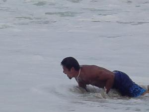 Phil getting beat up by the waves