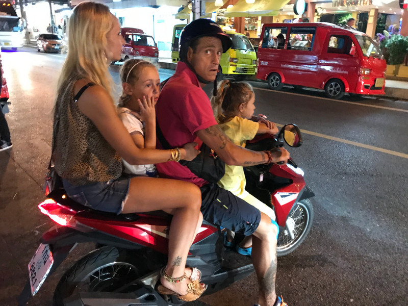 Tourist Family on Bike