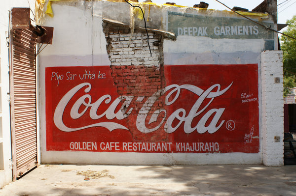 coke sign on wall