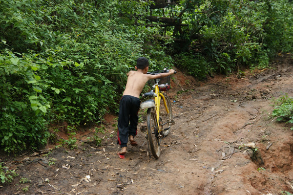 hill tribe boy with bike