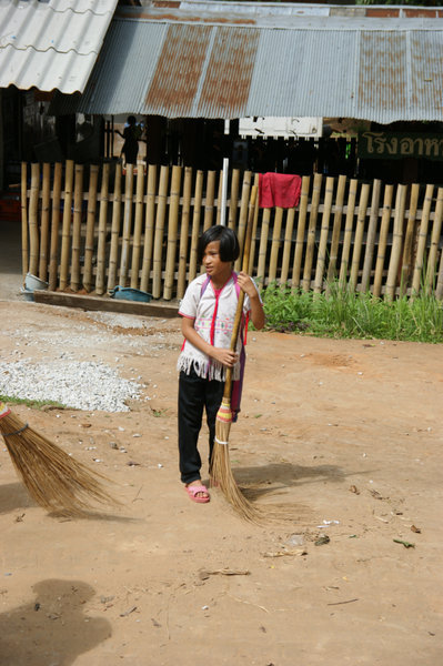 girl sweeping
